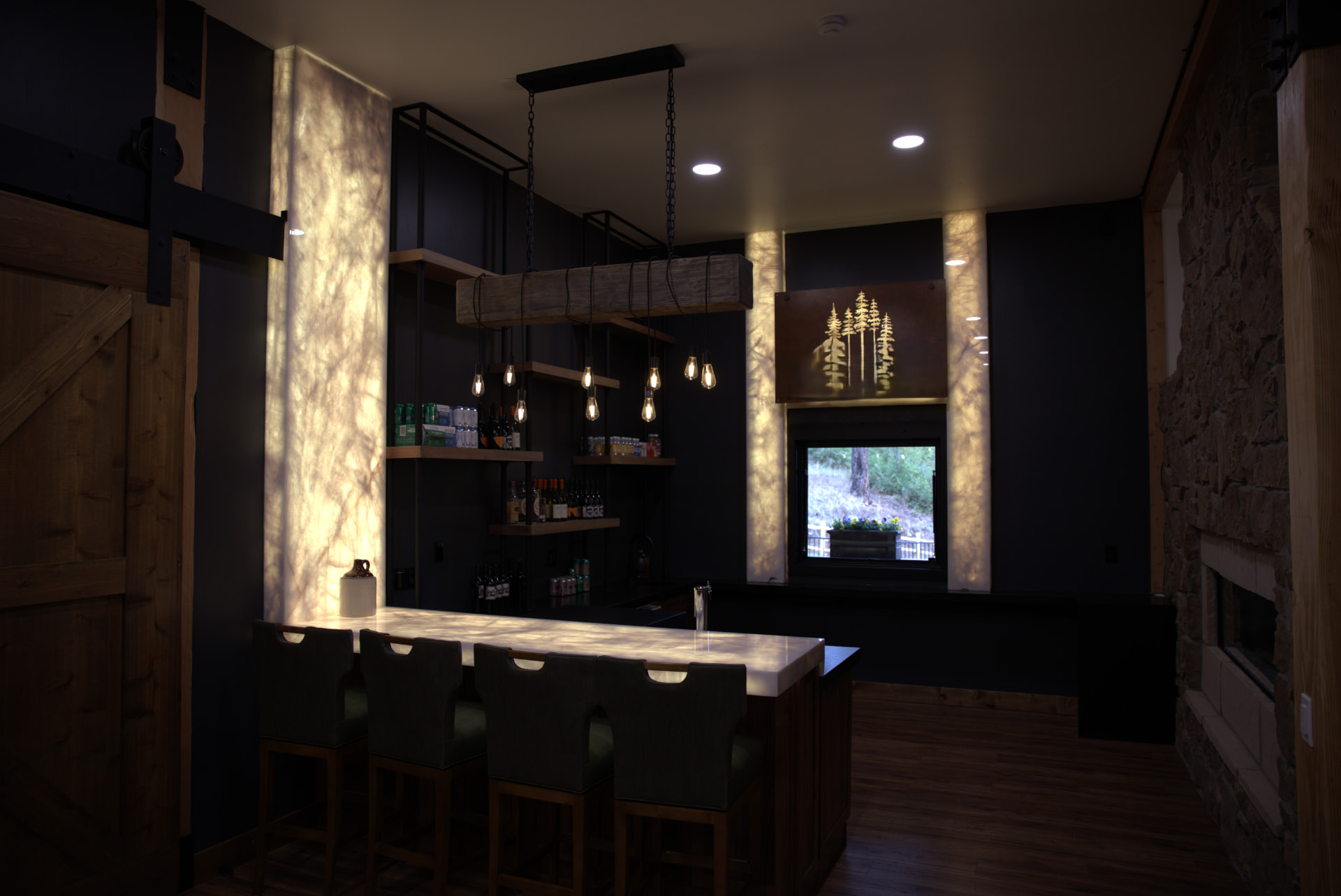 Home bar with a backlit onyx countertop, illuminated wall panels and a beam-mounted Edison bulb fixture wired by iPowerDenver
